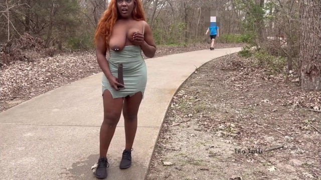 Naughty Girl Fucks and Sucks her Toy on a Busy Trail