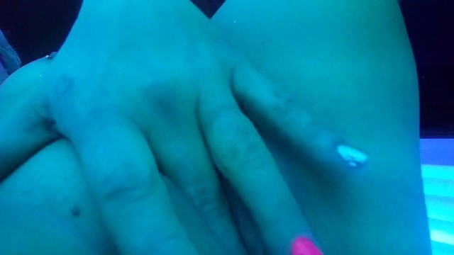 MILF Jacks Clit in Tanning Bed