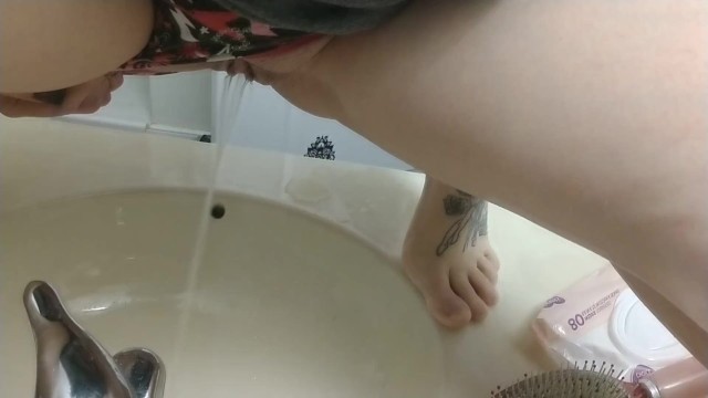 Pissing in the Bathroom Sink