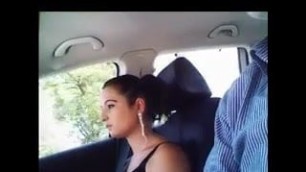 Latina sucks dick with a condom in the car