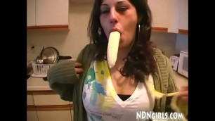 NDNgirls&period;com &vert; Native American Indian girl dared to suck a large banana ends up giving big black cock blowjob in the kitchen